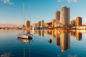 skyscrapers and their reflection on the lake in manila bay manila philippines